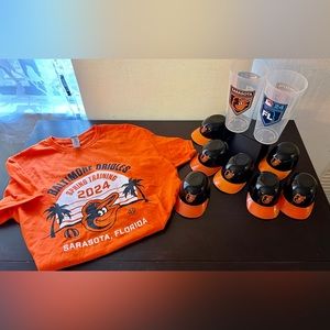 Orioles Spring Training 2024 t-shirt (sz. M) 7 small helmets & 2 souvenir cups.